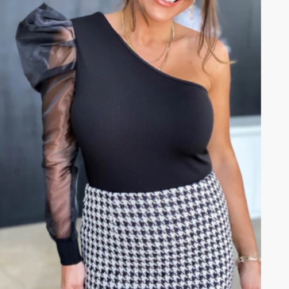 One shoulder black, puff sleeve bodysuit.